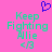 Pixelated icon with pink background, green text, and blue heart symbol above text.