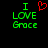 Green pixelated text 'I LOVE Grace' with a red heart symbol above the word 'LOVE', displayed on black background.
