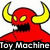 Red pixelated creature with yellow horns and glowing eyes, mouth open in a black void, below text reading 'Toy Machine' on black background.