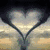 Four heart-shaped compositions with varied backgrounds and color schemes, each formed by hands or natural elements in a