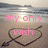 Beach scene with heart-and-arrow drawing on sand, pink text forming a sentence