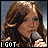 A four- shows a person with brown hair holding a microphone, with text overlays reading 'I GOT', 'THE', and 'HCPHEEVER'