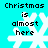 Pixelated cyan background with white snowflake and black text reading "Christmas is almost here" in four identical