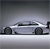 A silver sports car with black accents is positioned in profile view against a gradient gray background, appearing to move from left to right.