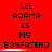 Red background with repeated text "LEE ADAMA IS MY BOYFRIEND" in black pixelated font, showing horizontal white blur effects on the word "BOYFRIEND".