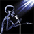 Pixelated figure in blue tones holding a microphone under a bright light beam against a black background.