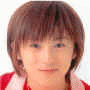 A person with short brown hair wearing a red and white collared shirt appears in a of with animated text overlays changing