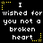 Black background with white pixelated text repeating 'I wished for you not a broken heart' across three , each framed by yellow star and dotted line borders
