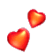 Red heart shapes of varying sizes float against a gray background in an animated sequence.