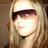 A four- shows a pixelated image of a person with long blonde hair and sunglasses in the top-left, text reading 'can you say' above three squares in the top-right, and 'BAM!' below them