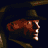 Pixelated static icon of a brown animal-like figure with white accents against dark background, possibly from a movie-themed buddy collection.