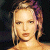 Pixelated image of a person with light brown hair against dark background, next to green text reading Original Icons .com in bright green pixel font.