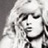 Static grayscale pixel art of a stylized human face with closed eyes and flowing hair, rendered in low-resolution 256x256 pixels with dithering effects.