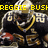 Pixelated image of a person in a football uniform with a gold chain, yellow text reading REGGIE BUSH above, and red and brown accents on the uniform.