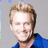 A four- displays a pixelated image of a smiling person with light brown hair and blue clothing in the top-left, 'Billy Jeffrey' text on blue background top-right, 'Vegas Baby' text on pink background bottom-left, and empty gray space bottom-right