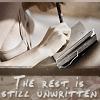 A static image shows a person in a white shirt with a black tie holding a stack of papers, with text at the bottom reading "THE REST IS STILL UNWRITTEN."