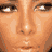 A 6-frame animated contact sheet showing a woman's face in various expressions and angles, with visible pixelation and dithering effects across all frames.