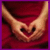 Pixelated icon of a character with large eyes and rounded ears against a red background, bordered by purple.