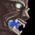 Pixelated static image of a cartoonish monster face with glowing eyes and blue mouth details on dark background.