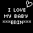 Black background with white pixelated text reading "I LOVE MY BABY" and "***ERIN***" beneath a heart symbol.