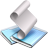Pixelated icon shows a white cylindrical object resting on a light blue surface with darker blue accents, set against a solid gray background.