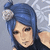 Pixelated character with blue hair in a bun, wearing dark clothing and a white floral accessory on the head.