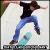 A skater in mid-air performing a trick, wearing black shirt and blue jeans with light blue skateboard.