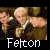 Pixelated image of two figures in close physical proximity with one figure's arm around the other, overlaid with white text reading 'Fetton' at bottom.