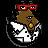 Pixelated character with brown hair, red glasses, and a white lab coat holding an orange object against black background.