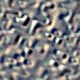 Static pixelated image of a textured fabric pattern with interwoven light and dark tones in blue, gray, and beige hues.