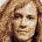 Static image with black background, pixelated portrait, and distorted text elements including 'SASAV' and 'TNT' logo.