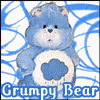 Blue Care Bear with cloud symbol on chest, standing against blue scribble background; text "Grumpy Bear" below.