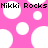 Pixelated pink background with white circles and black text reading "Nikki Rocks" repeated twice.