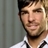 Pixelated close-up of a person's face and upper torso in a static image with visible dithering and anti-aliasing artifacts.
