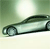 A light green sedan with dark green roof and black trim appears in profile view against a gradient background transitioning from green to white.