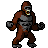 Pixelated character with brown fur, gray chest armor, and black gloves holding a large dark object in each hand.