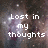 Pixelated image with white text reading 'Lost in my thoughts' over a blurred background of muted purples and browns.
