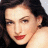 A pixelated image of a person with dark hair and red lips on the left, next to green text reading 'Original Icons .com' on a solid green background.