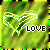 Animated green pixelated heart outline with text changing from 'LOVE' to 'ME' on a blurred green background.