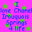 A static image with a bright pink background, green stars, and blue text reading "I love Chanelle Irouquis Springs 4 life" repeated twice in a