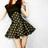 A pixelated figure in a dark patterned dress stands against a light background with red text reading "fashion victim" on the right.