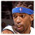 A basketball player wearing a blue headband with red and white logo, white jersey, and visible facial hair in various expressions.