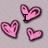 Pink heart-shaped icons with dark pink outlines arranged in a cluster on a light gray background, displaying text overlays.
