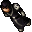 Pixelated character in dark outfit with light accents, brown face, and dark hair, shown in two sequential poses against gray background.