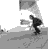 A 4x4 contact sheet of grayscale animated frames showing a person performing a skateboarding trick sequence with crouched, airborne, and landing poses against a blurred background.