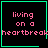 Four identical black square with green borders display pink pixelated text reading 'living on a heartbreak' and one contains an additional small green heart symbol