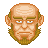 Pixelated portrait of a bald man with brown sideburns and beard, light skin tone, yellow eyes, furrowed brows, neutral mouth expression on gray background.