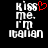 Pixelated text 'KISS me. I'm Italian' with a red heart symbol replacing the letter O in KISS, displayed on black background.