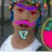 Pixelated image of a person with purple headband and pink mustache next to cartoon character with red hair bows and blue dress.