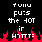 Pixelated text reads "fiona puts the HOT in HOTTIE" above red flame graphics on a black background.